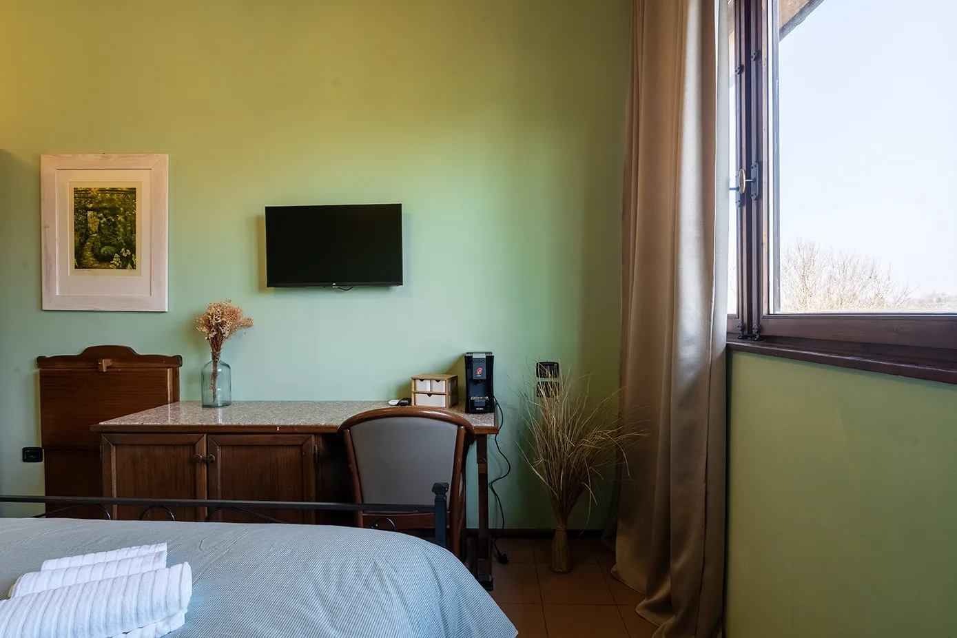 Camera con letto matrimoniale alla Locanda CasaMerlò a Calderara di Reno, Bologna